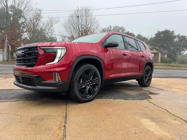 2026 GMC Acadia Elevation in Volcanic Red Tintcoat — front three-quarter view