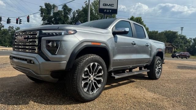 2026 GMC Canyon Denali in Sterling Metallic — front three-quarter view